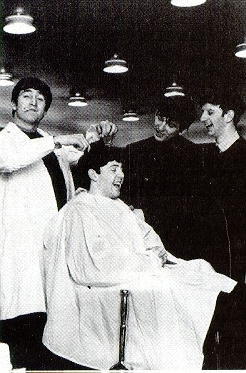 In basement hairdressing salon at Dunn's men shop, Liverpool