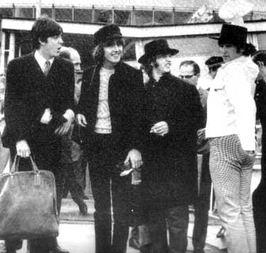 The Beatles arriving from European tour