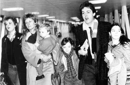 Paul, Linda and their children at the airport